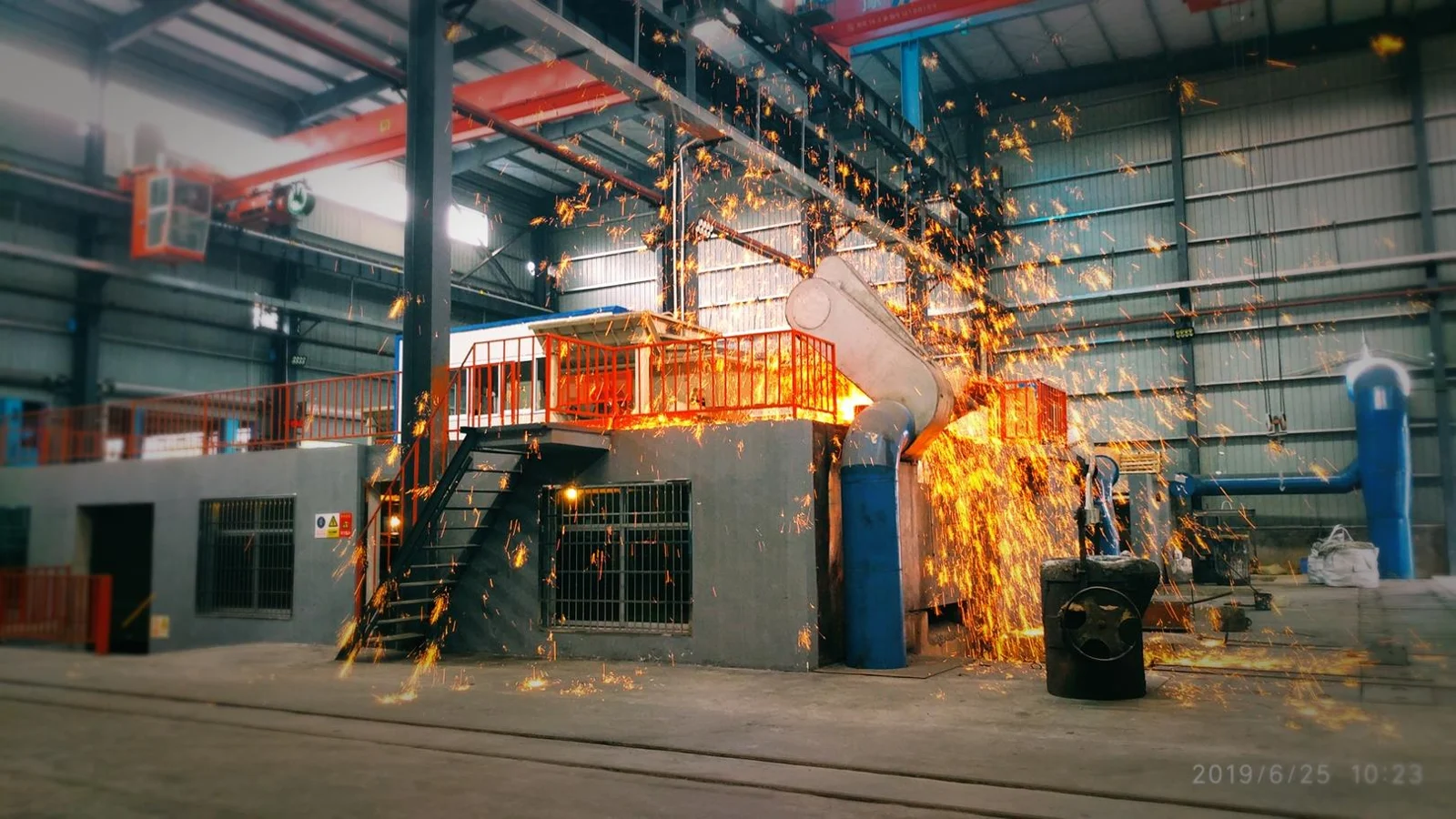 Metal melting equipment shown in XRM's manufacturing presentation